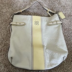 Classic cream coach bag.